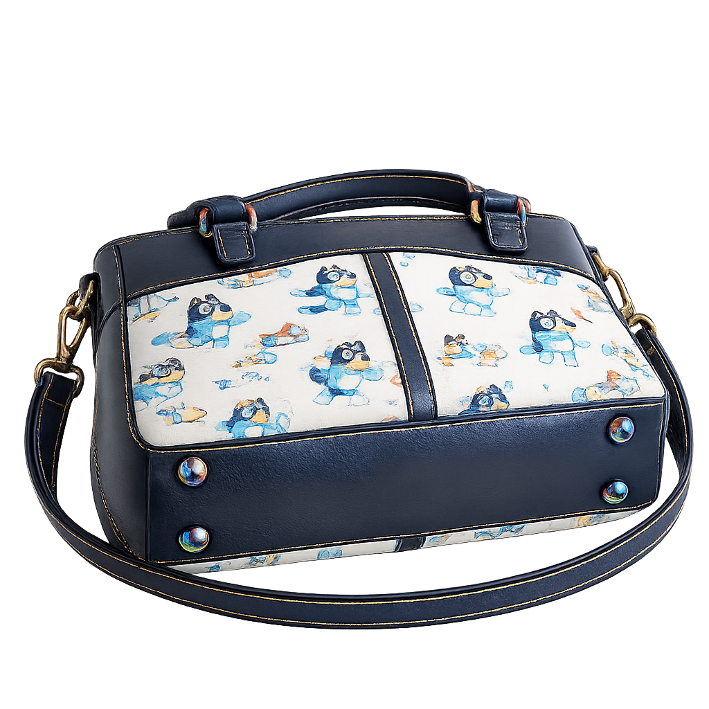 Bottom view of Regan handbag showing protective purse feet, structured base, and faux leather construction.