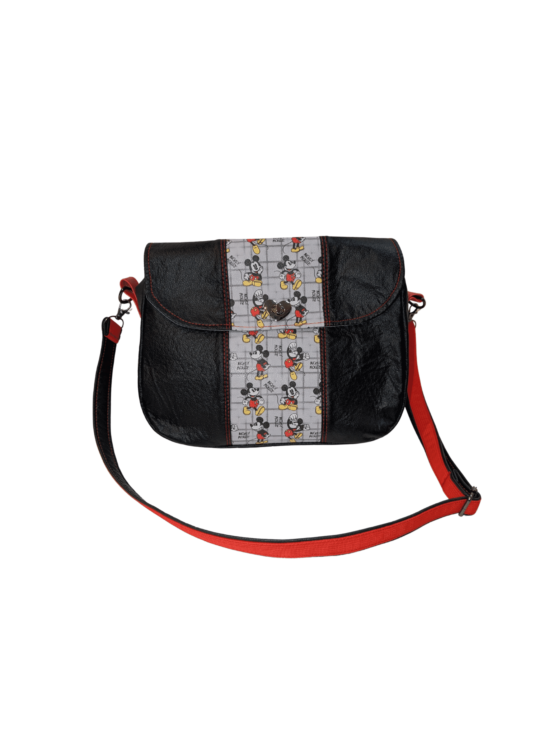 Black printed crossbody handbag with red accents and adjustable strap