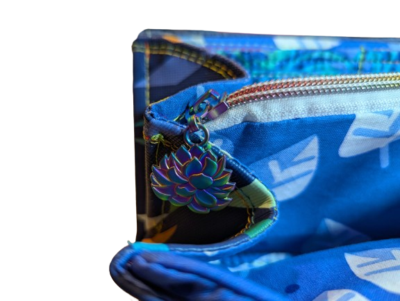 This image showcases the fully expanded accordion wallet interior with accordion construction, divided storage compartments, and organized everyday functionality.