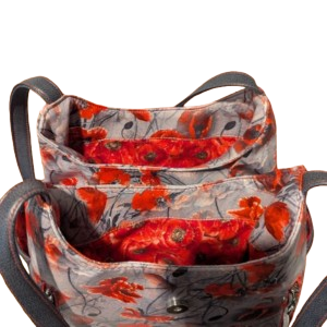 Open interior of floral hobo handbag with divided storage compartments.
