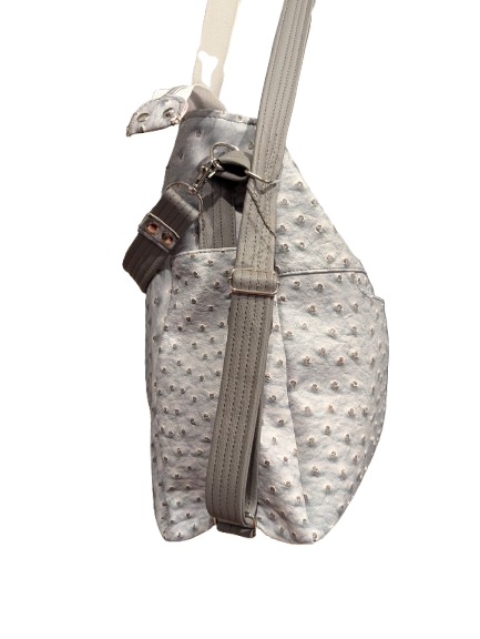 crossbody bag with turquoise zipper accents
