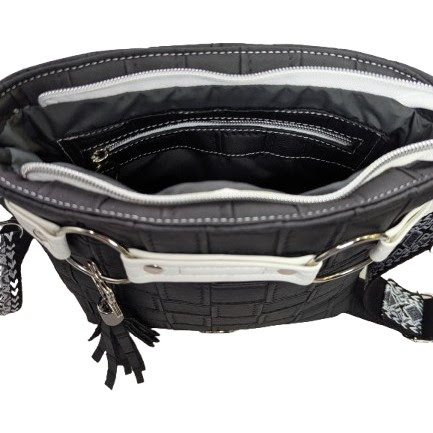 black faux leather crossbody handbag interior zipper pocket detail