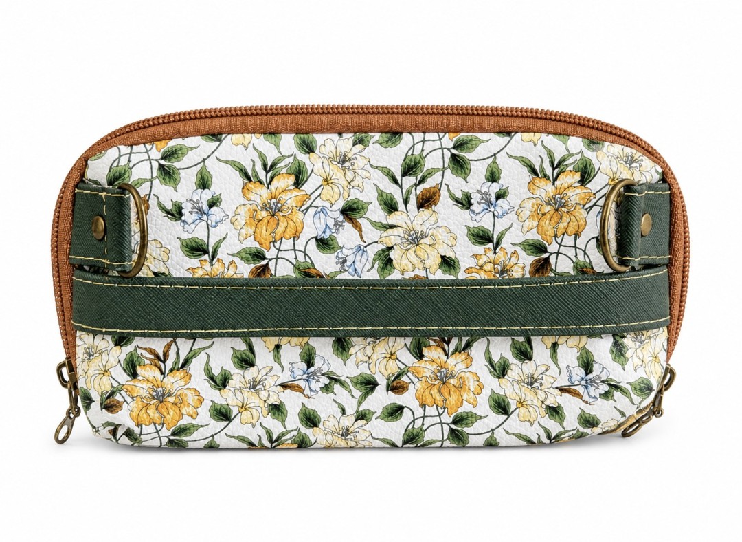Front view of handmade green floral wallet clutch with faux leather trim