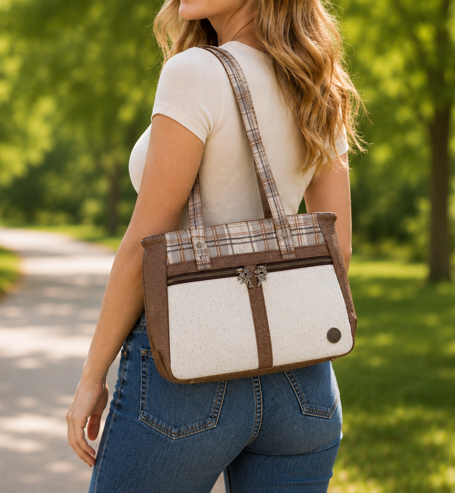 Handmade neutral plaid tote handbag featuring cream faux ostrich leather, brown faux leather accents, and plaid fabric with double shoulder straps.