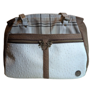 Front view of neutral plaid handbag with faux leather accents and organized zipper pockets.
