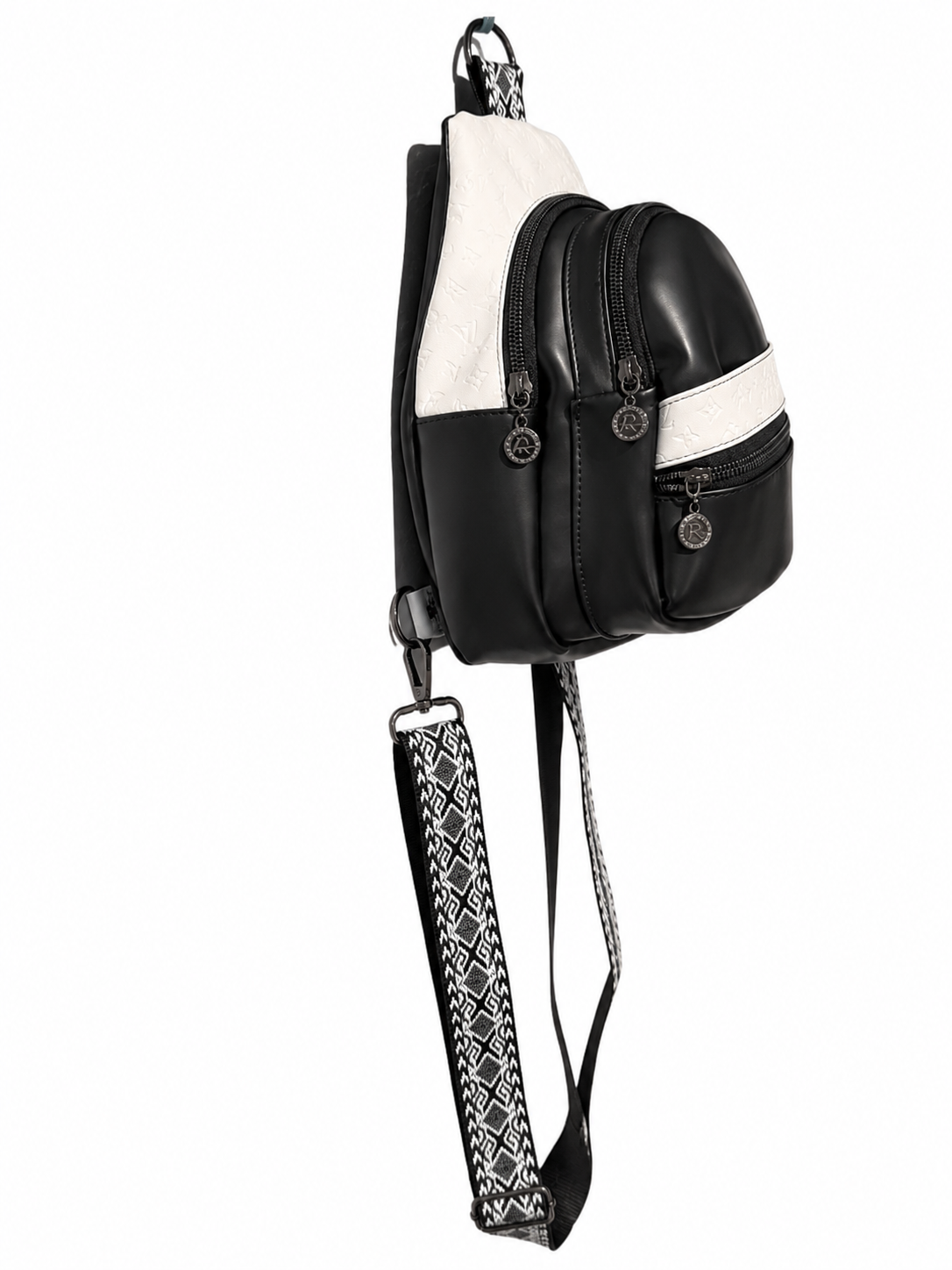 Left side profile of a custom handmade mini sling bag showing its slim design.