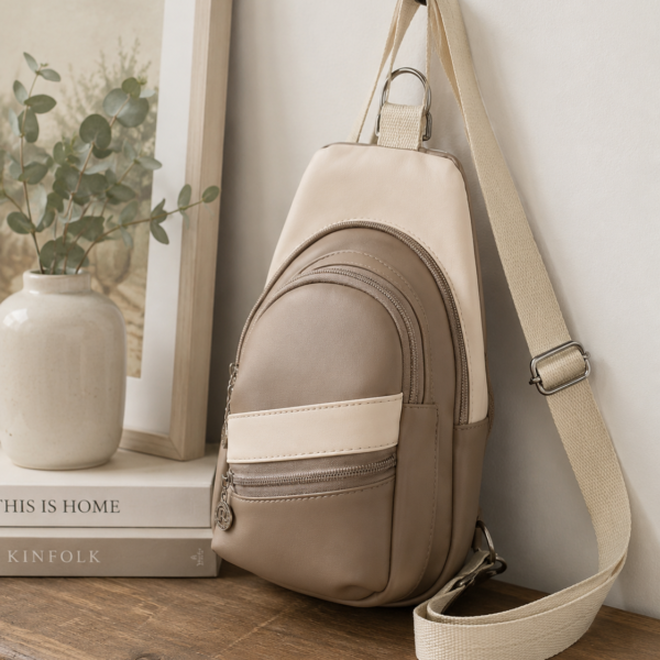 Custom handmade mini sling bag displayed in a neutral home setting.
