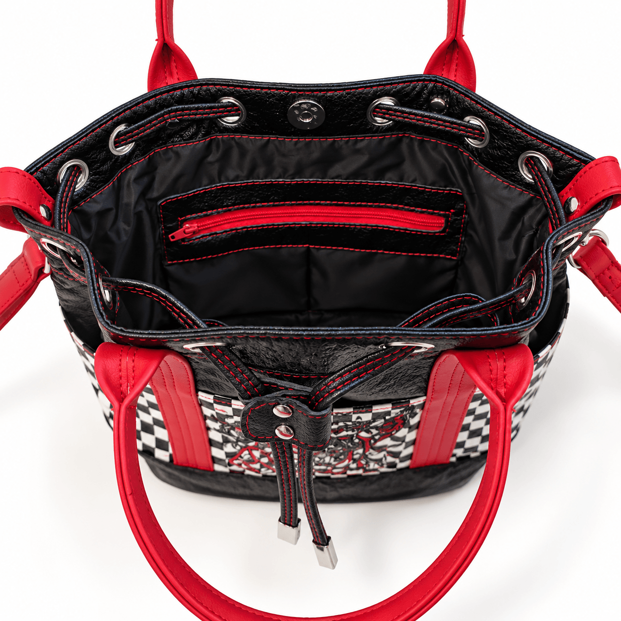 Black lined bucket handbag interior with red zipper pocket and red contrast stitching
