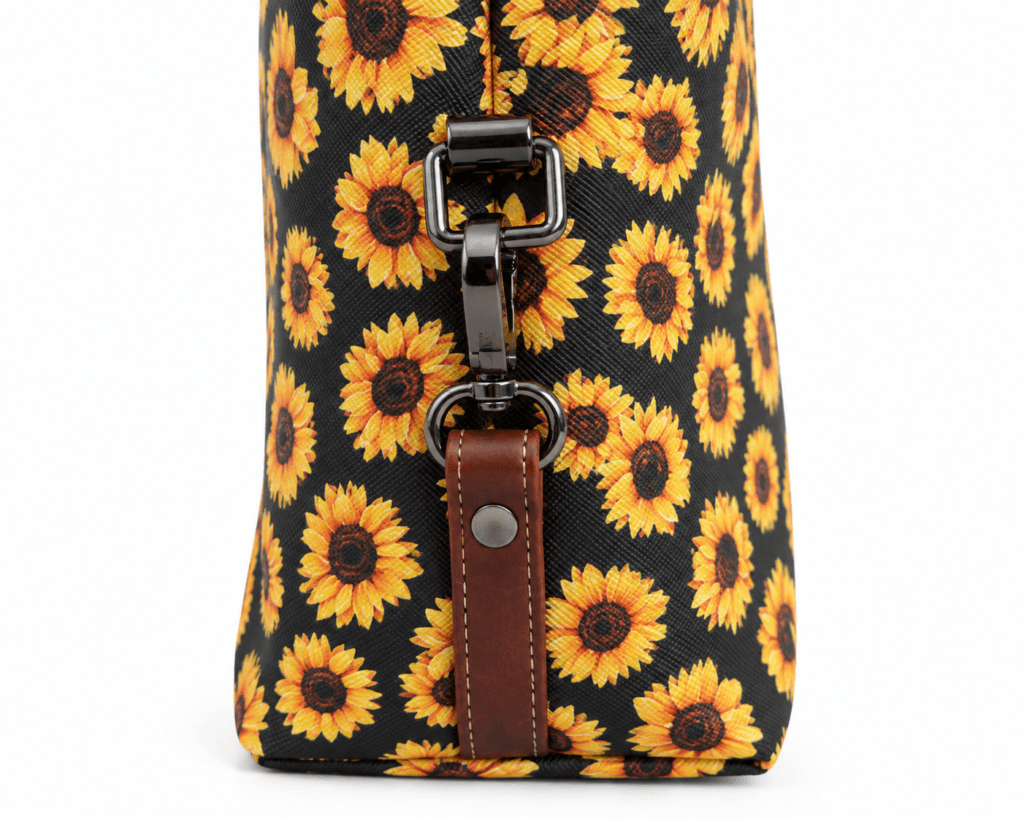 Close-up of removable strap hardware on sunflower tote bag