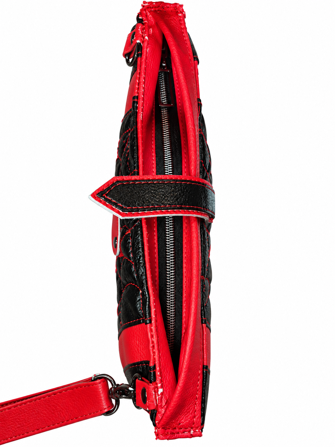 Top view of red and black spiderweb quilted wristlet showing its slim profile, metal zipper, red faux leather trim, and detachable wrist strap.